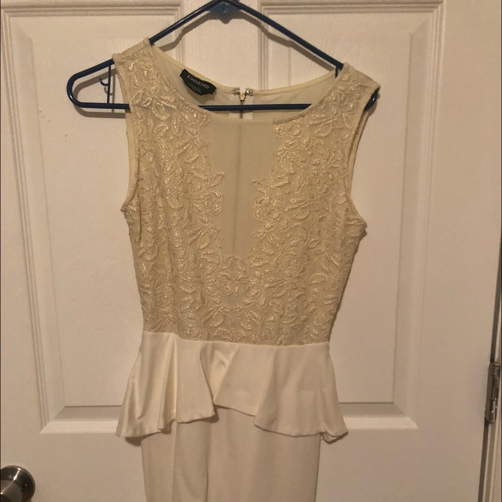 Bebe Cream colored Peplum Dress